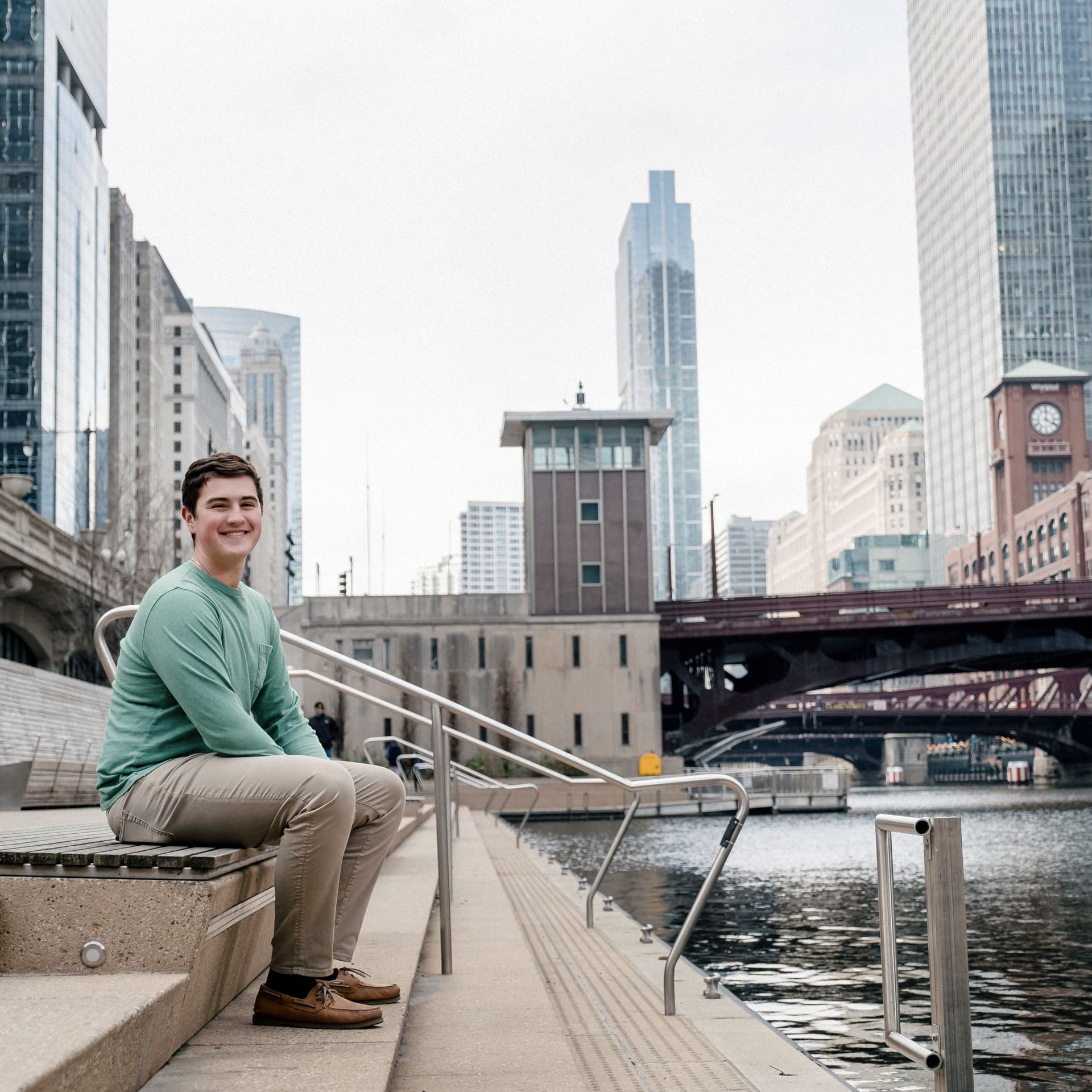 Boy poses outdoors for his free senior portrait photoshoot